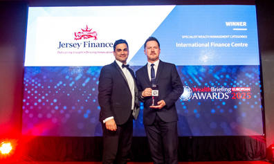 Robert Moore receiving Jersey's award at the Wealthbriefing European Awards 2025