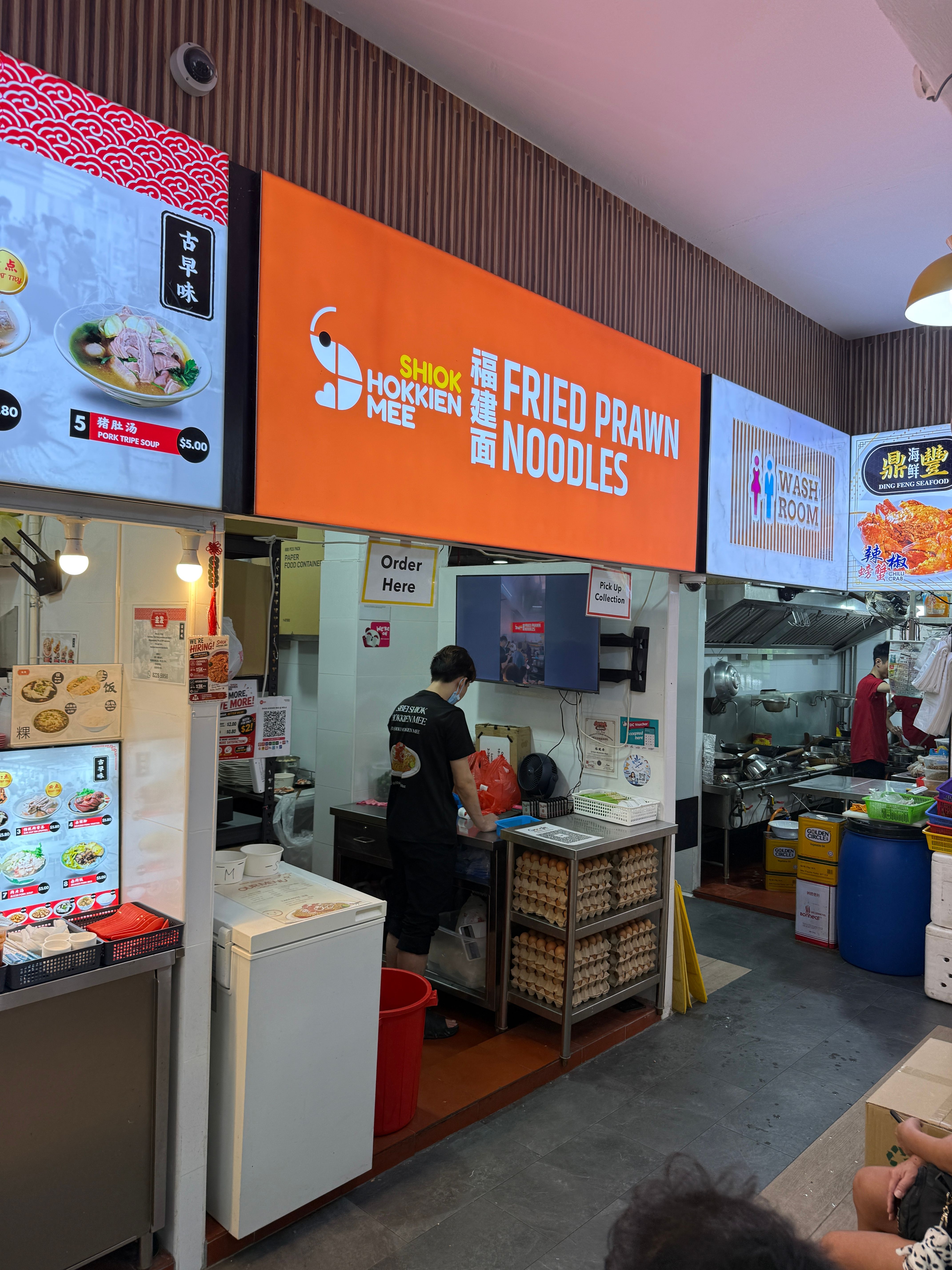 Shiok Hokkien Mee Woodlands stall front at S-11 Food House with orange fried prawn noodles sign