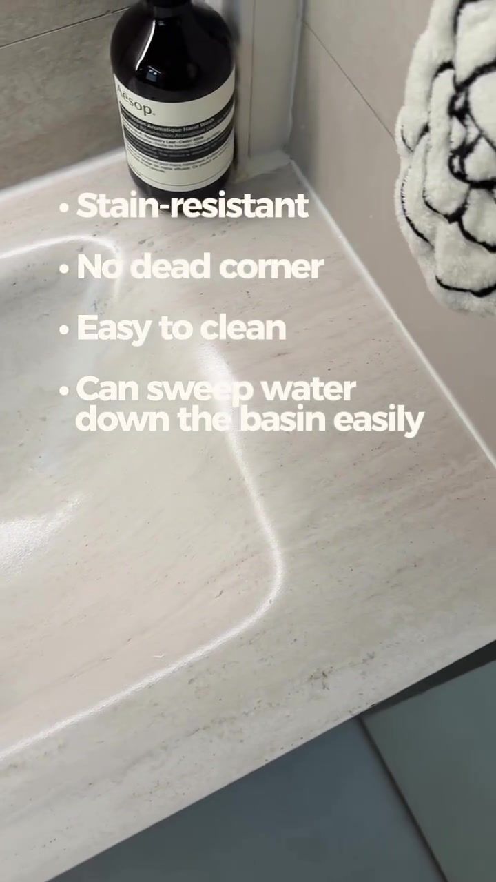 Sintered stone sink basin close-up with chrome drain, overlay listing stain-resistant, no dead corner, easy to clean, can sweep water down the basin easily