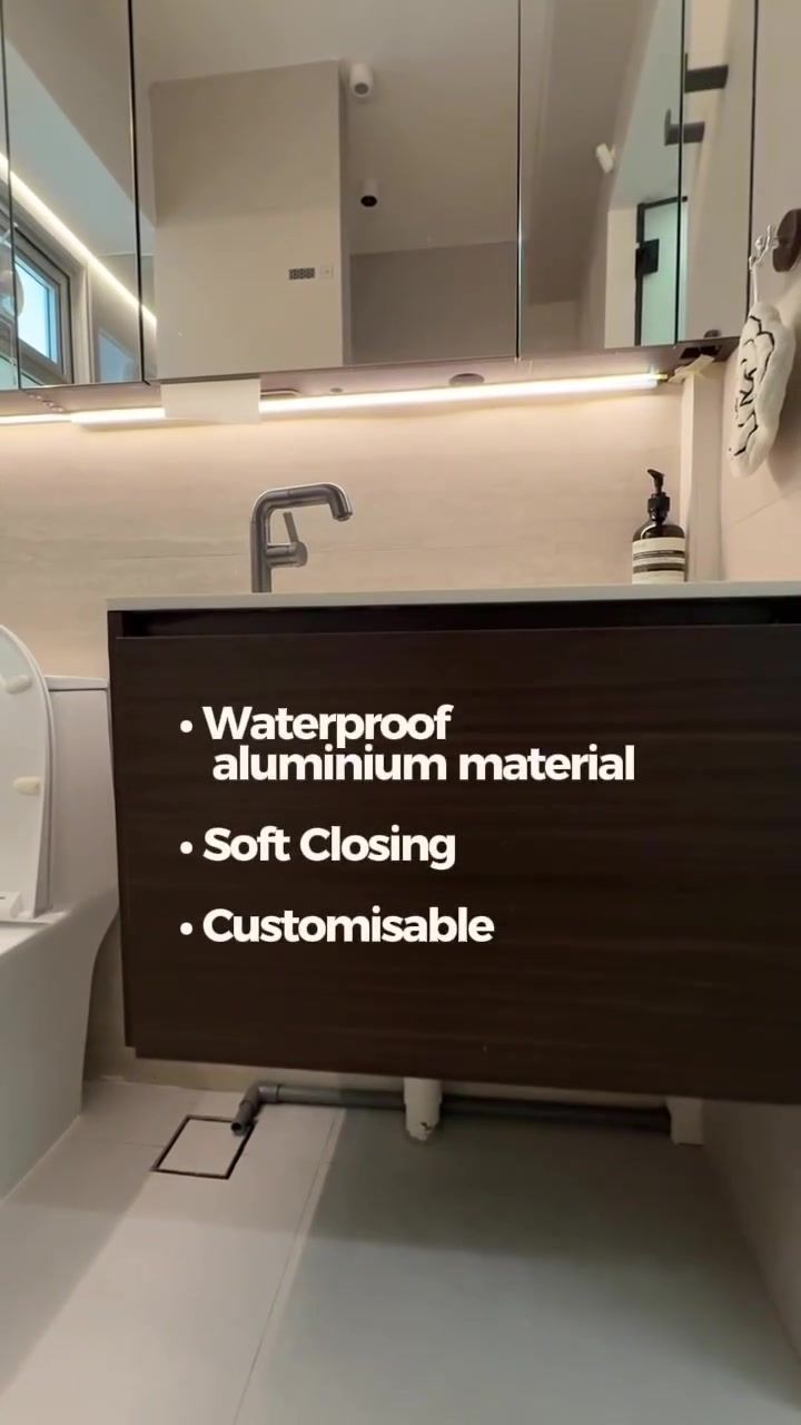 Dark wood-look floating aluminium vanity with white counter, square gooseneck tap, mirror cabinet under-light, overlay waterproof aluminium soft closing customisable