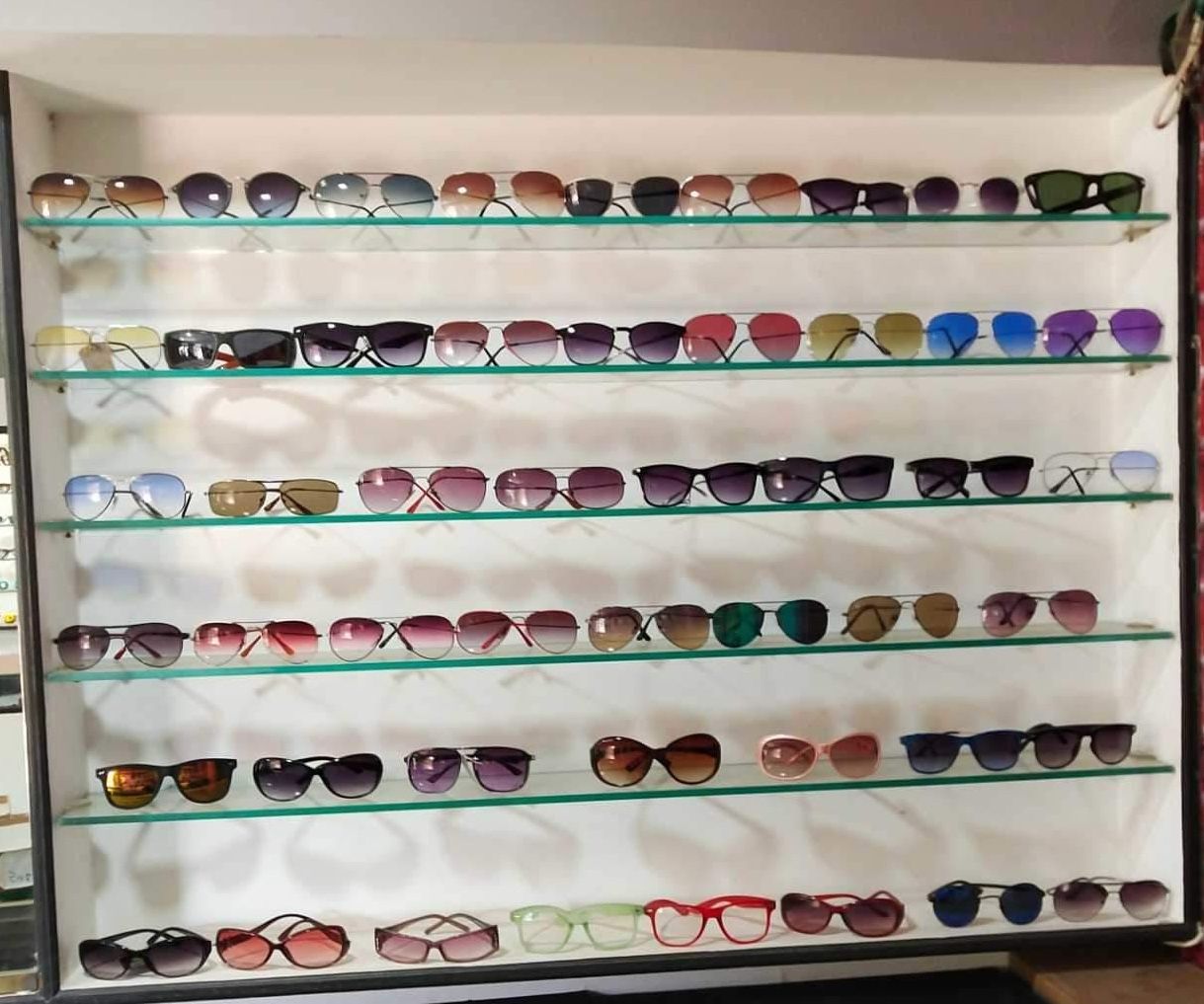 Nirmala Opticians logo