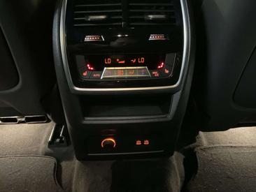 BMW XM 50e — photo 12
