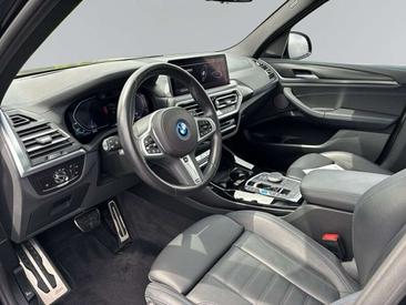 BMW iX3 — photo 8