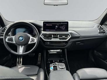 BMW iX3 — photo 11