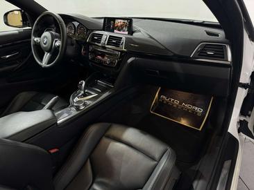 BMW M4 Competition — photo 19