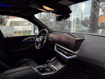 BMW XM 50e — photo 10