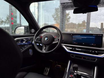 BMW XM 50e — photo 11