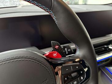 BMW XM 50e — photo 16