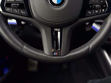 BMW XM 50e — photo 17