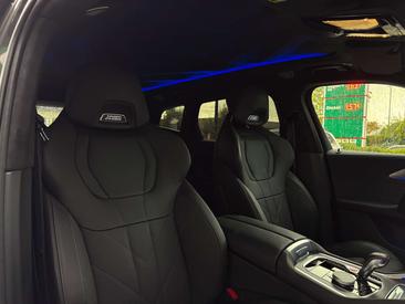 BMW XM 50e — photo 27