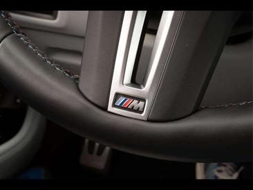 BMW XM 50e — photo 17