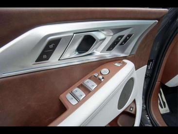 BMW XM 50e — photo 21