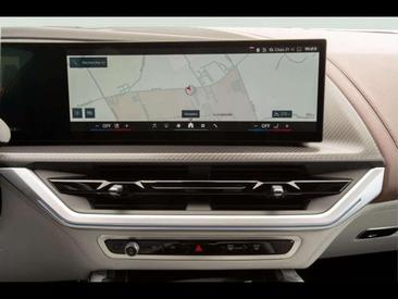 BMW XM 50e — photo 24