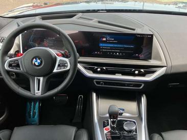 BMW XM 50e — photo 7