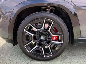 BMW XM 50e — photo 11