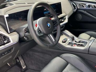 BMW XM 50e — photo 14