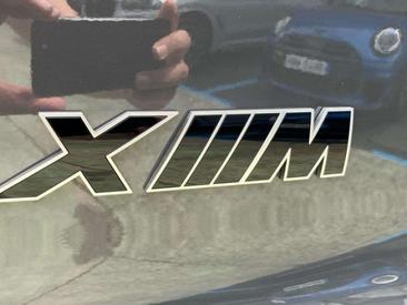 BMW XM 50e — photo 21