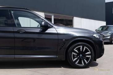 BMW iX3 — photo 11