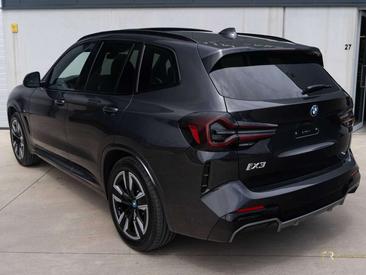 BMW iX3 — photo 28