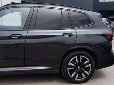 BMW iX3 — photo 31