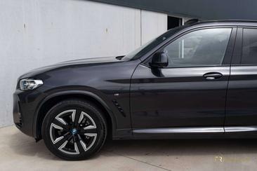 BMW iX3 — photo 32