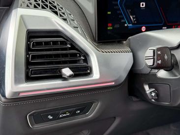 BMW XM 50e — photo 11