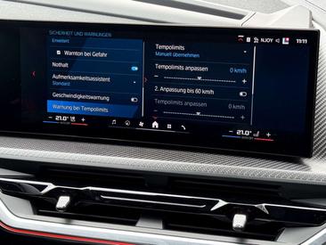 BMW XM 50e — photo 33