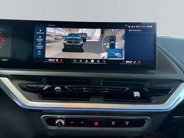 BMW XM 50e — photo 14