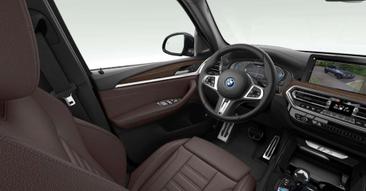 BMW iX3 — photo 10