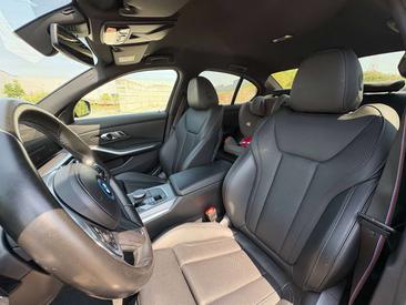 BMW 320e M Sport — photo 11