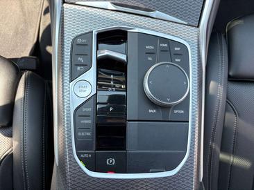 BMW 320e M Sport — photo 21