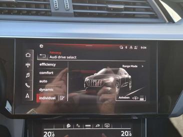 Audi E-tron S Line 50 — photo 16