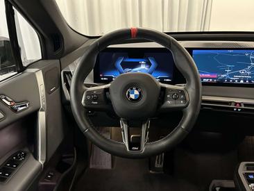 BMW IX M70 — photo 8