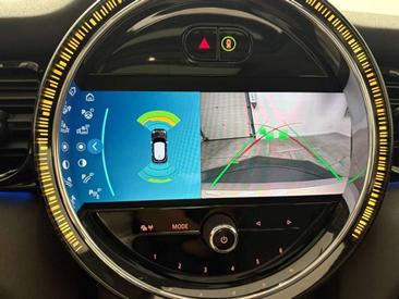 Mini Cooper E — photo 16