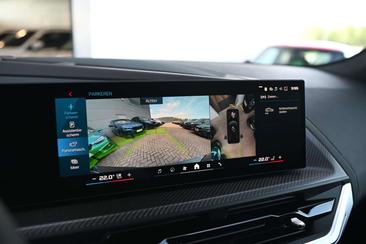 BMW XM 50e — photo 11