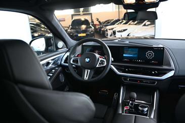 BMW XM 50e — photo 32