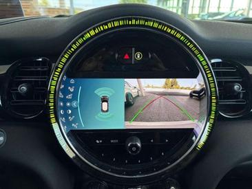 Mini Cooper E — photo 18
