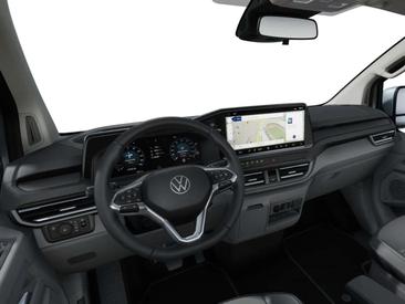 Volkswagen Multivan E-Caravelle Style — photo 10