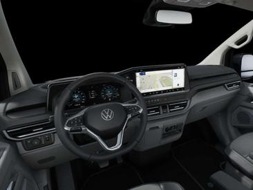 Volkswagen Multivan E-Caravelle Style — photo 3