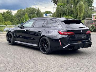 BMW M5 M Sport — photo 2