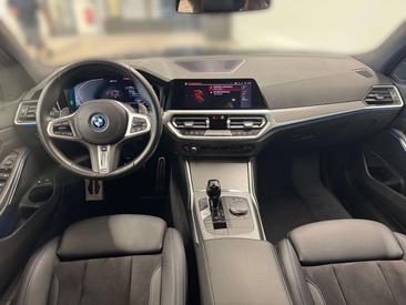 BMW 320 320e XDrive — photo 7