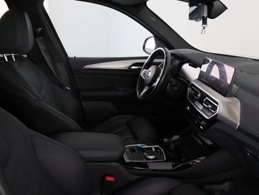 BMW iX3 High Executive EDrive40 — photo 24