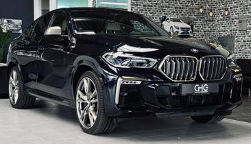 BMW X6 M50i — photo 2