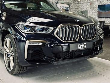 BMW X6 M50i — photo 7