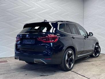 BMW iX3 — photo 12
