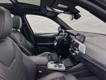 BMW iX3 — photo 18
