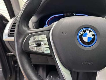 BMW iX3 — photo 29