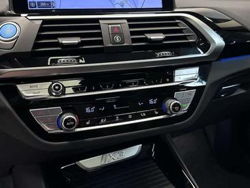 BMW iX3 — photo 33
