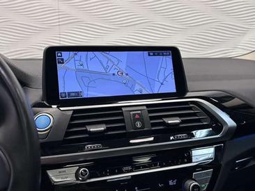 BMW iX3 — photo 34