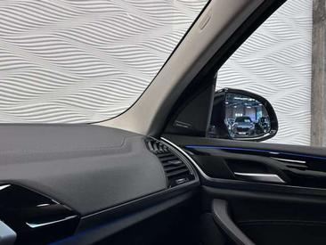 BMW iX3 — photo 38